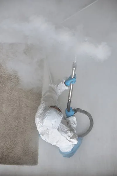 sewage cleanup Tampa Florida — licensed technician in protective gear